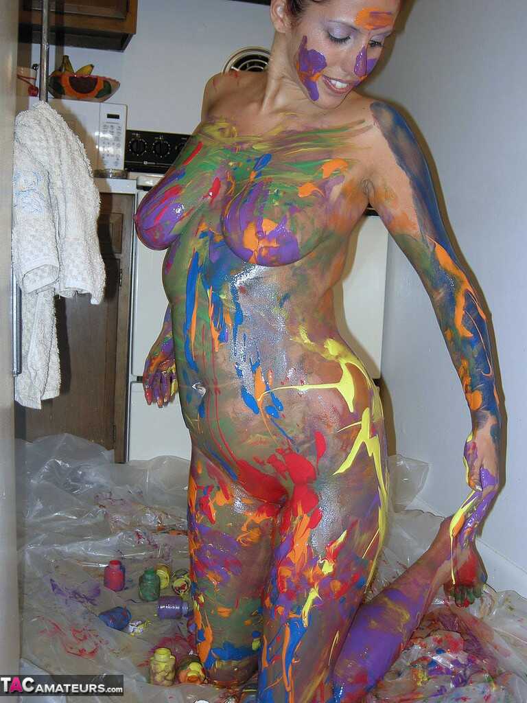 Busty amateur Lavender Rayne covers her naked body in body paint while showing off her big ass and milf solo - Lavender Rayne