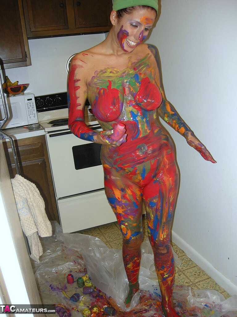 Busty amateur Lavender Rayne covers her naked body in body paint while showing off her big ass and milf solo - Lavender Rayne