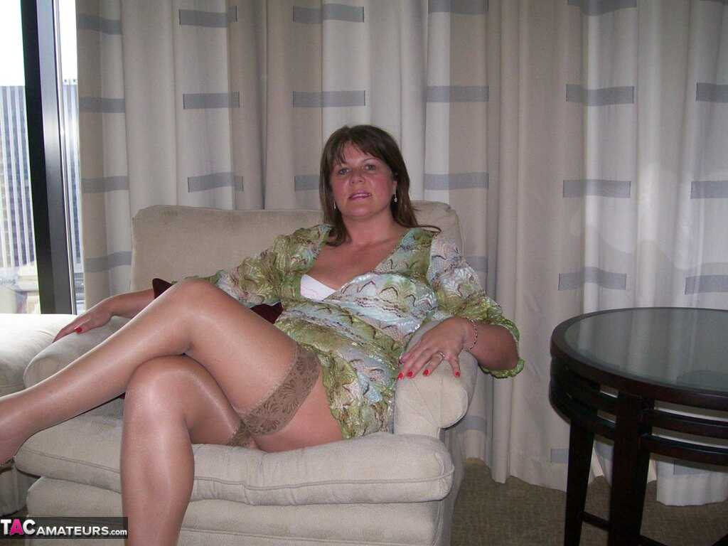 Amateur housewife Sandy slips her upskirt panties aside to pet her pussy - Sandy