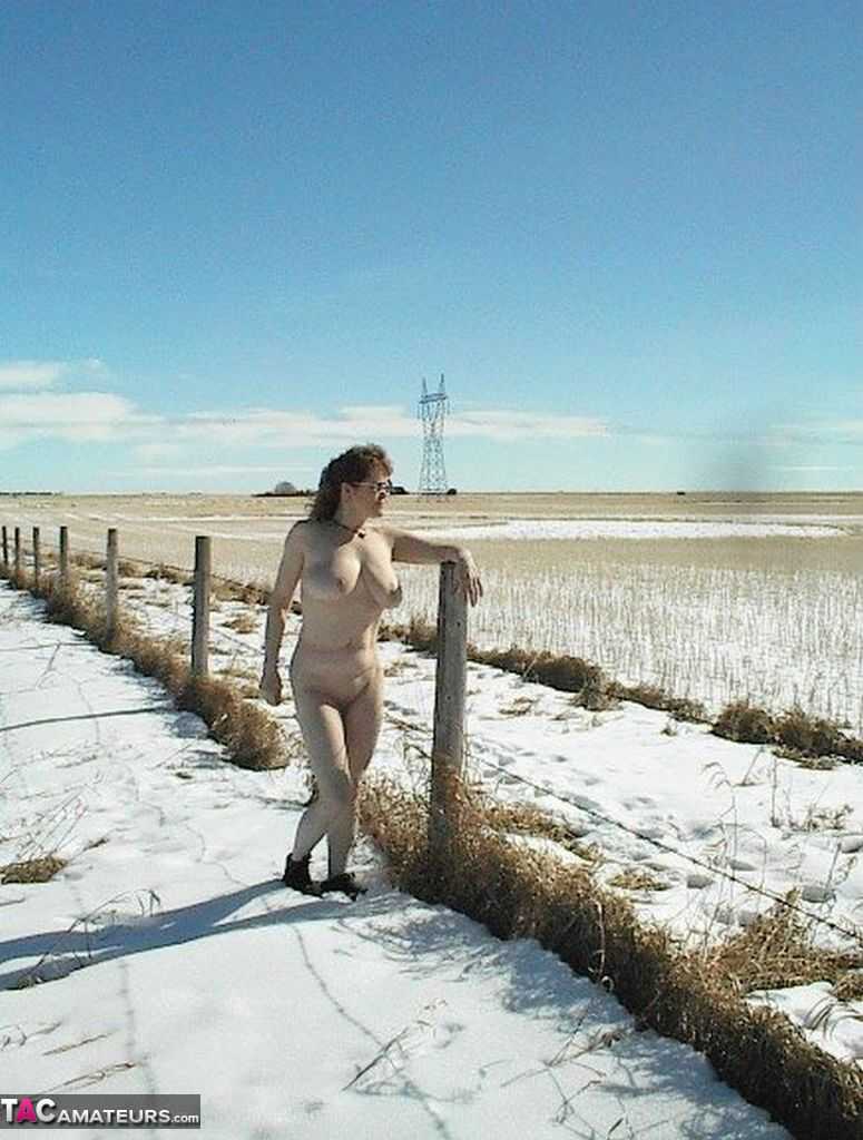 Winter's MILF Naked in the Snow with a Big Booty and Aging Breasts