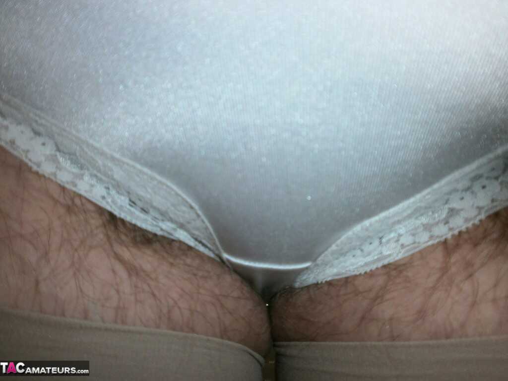Horny granny Caro in high heels flaunting her hairy armpits & mature ass while wearing saggy tits and panties - Caro