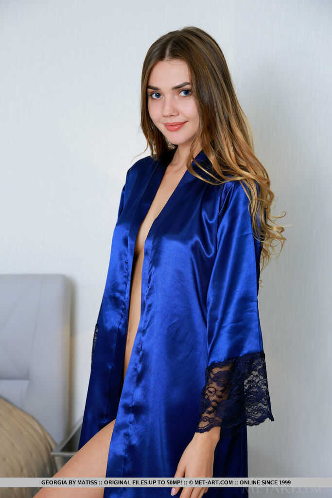 Beautiful teen Georgia slips off her satin robe for great nude poses and spreads her perfect ass while showing off her ass...
