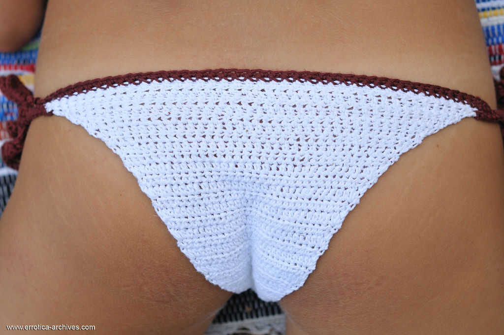 Beautiful Katarina B in knit bikini removes her top lying in the grass outside, teasing with her tight ass and innocent as...