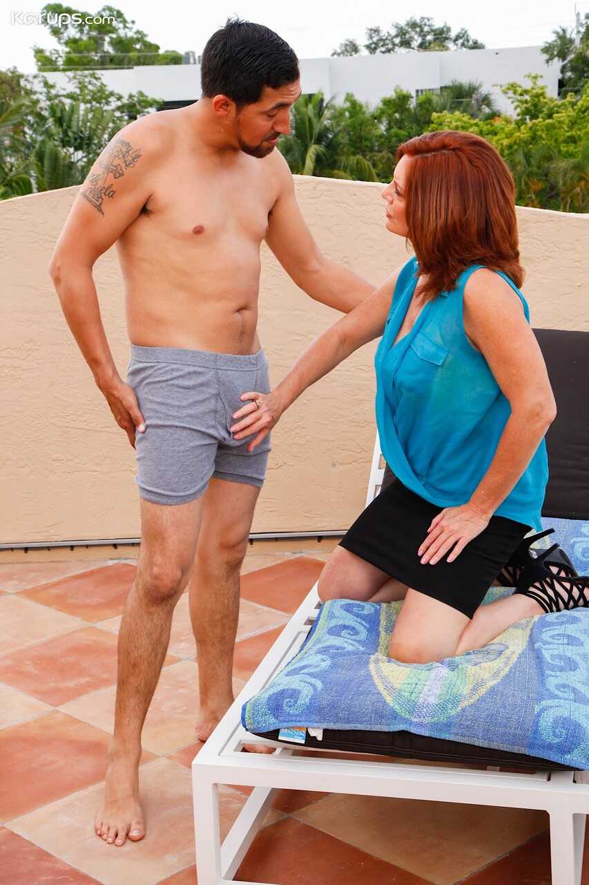 Red Hot Redhead: Andi James Seduces a Younger Man with her Mature Skills and Voluptuous Body - Andi James, Juan Largo