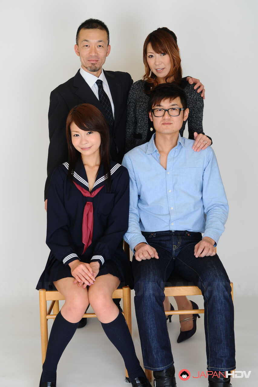 MILF Jun Kusanagi and her stepdaughter Yuri Aine pose naked with two cute men while getting spanked by a sexy dominatrix. ...