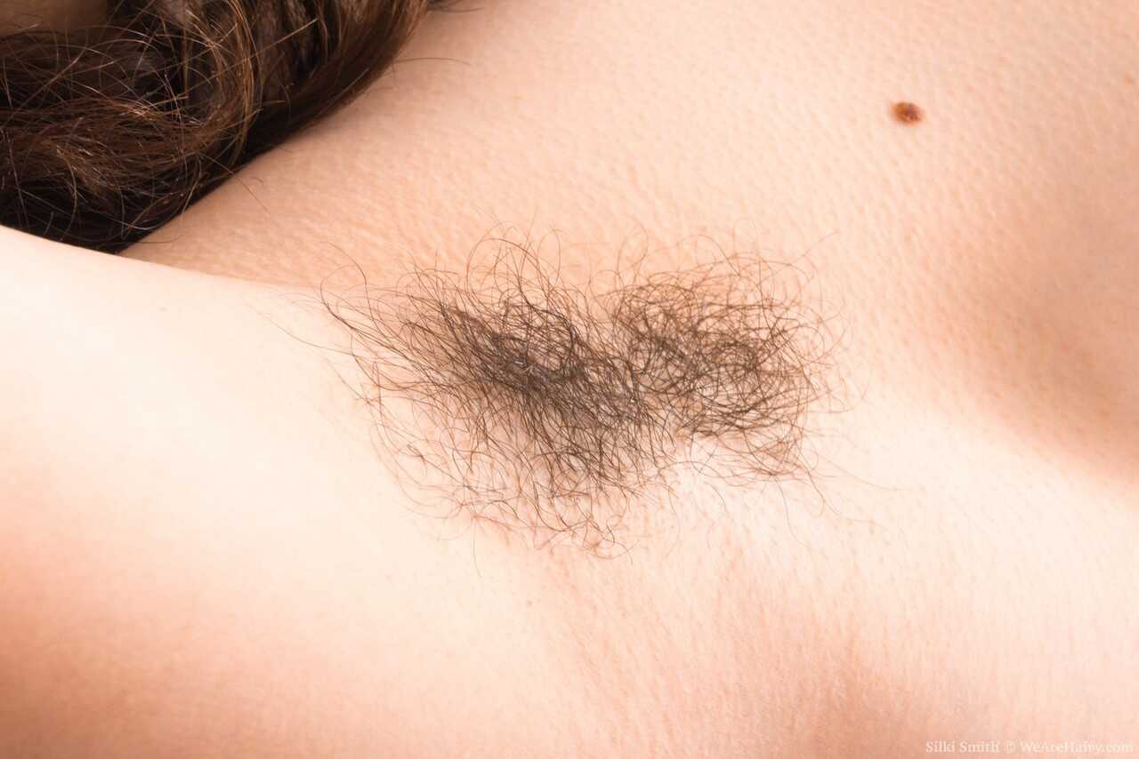 Amateur girl Silki Smith spreads her full bush and hairy armpits while sporting a hairy vagina and ass. - Silki Smith