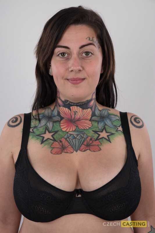 Tattooed Nikola releases her overweight body from clothing, unveiling her big fat tits and chubby ass for the camera