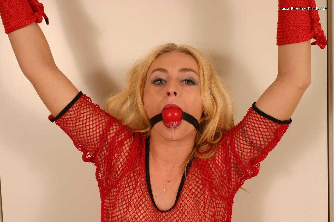Bondage Beauty Begs for Release as She Struggles to Breathe Through Her Ball Gag - 