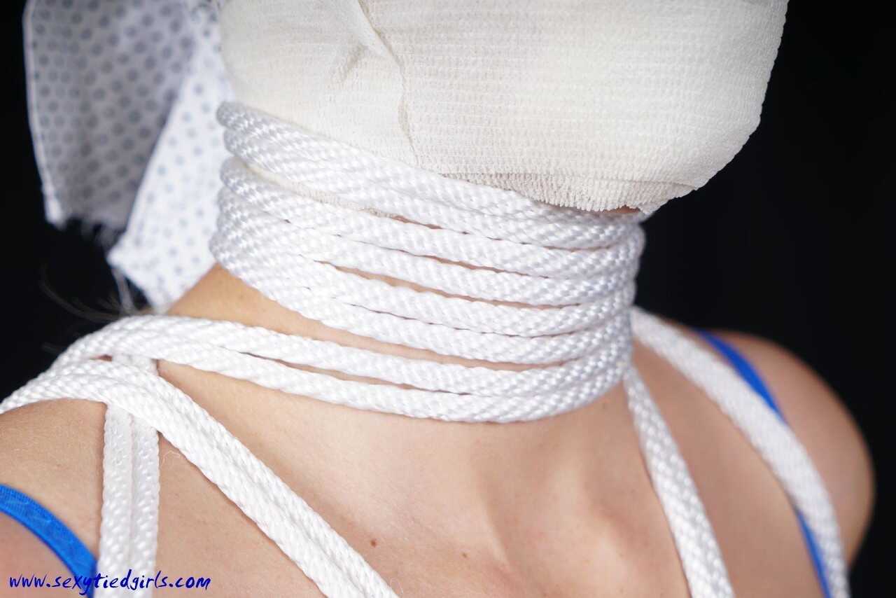 Blindfolded and Gagged Katerina Hartlova Tied to a Chair in See-Through Attire for BDSM Fun! - Katerina Hartlova