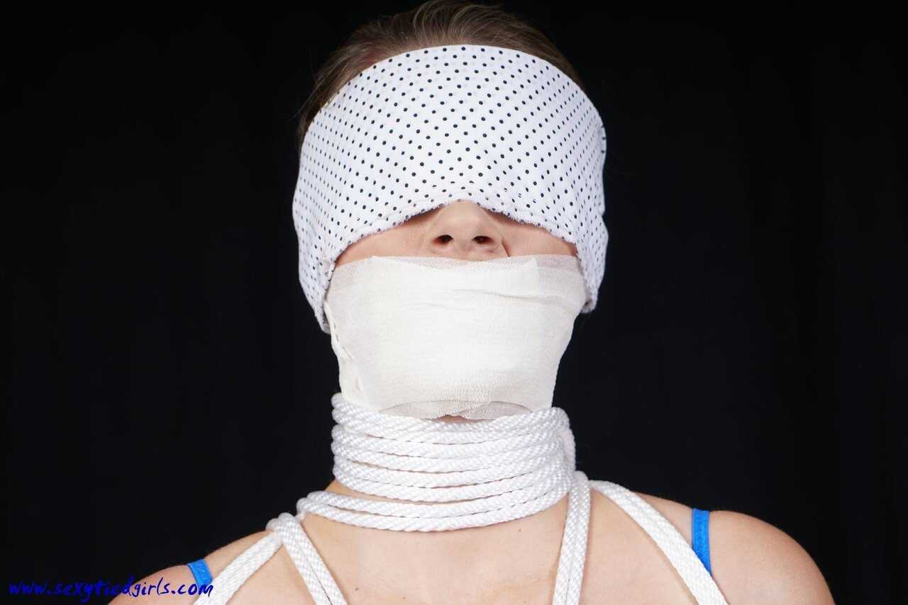 Blindfolded and Gagged Katerina Hartlova Tied to a Chair in See-Through Attire for BDSM Fun! - Katerina Hartlova