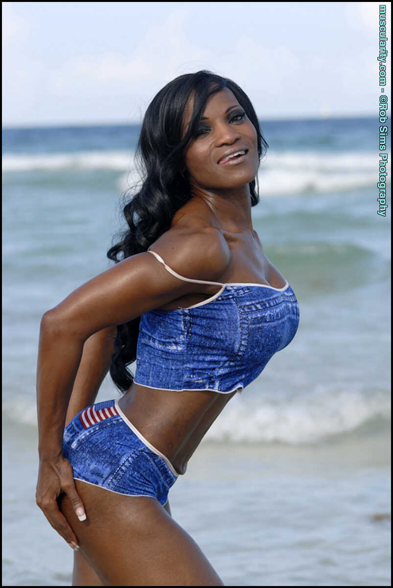 Black Bodybuilder Debra Dunn's Denim-Clad Flexes at the Beach