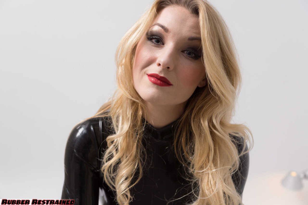 Nicky Alicia's Latex Fetish: Beautiful Blonde Adorned in Skintight Catsuit, Gloves and Heels on Display for Her Naugh...