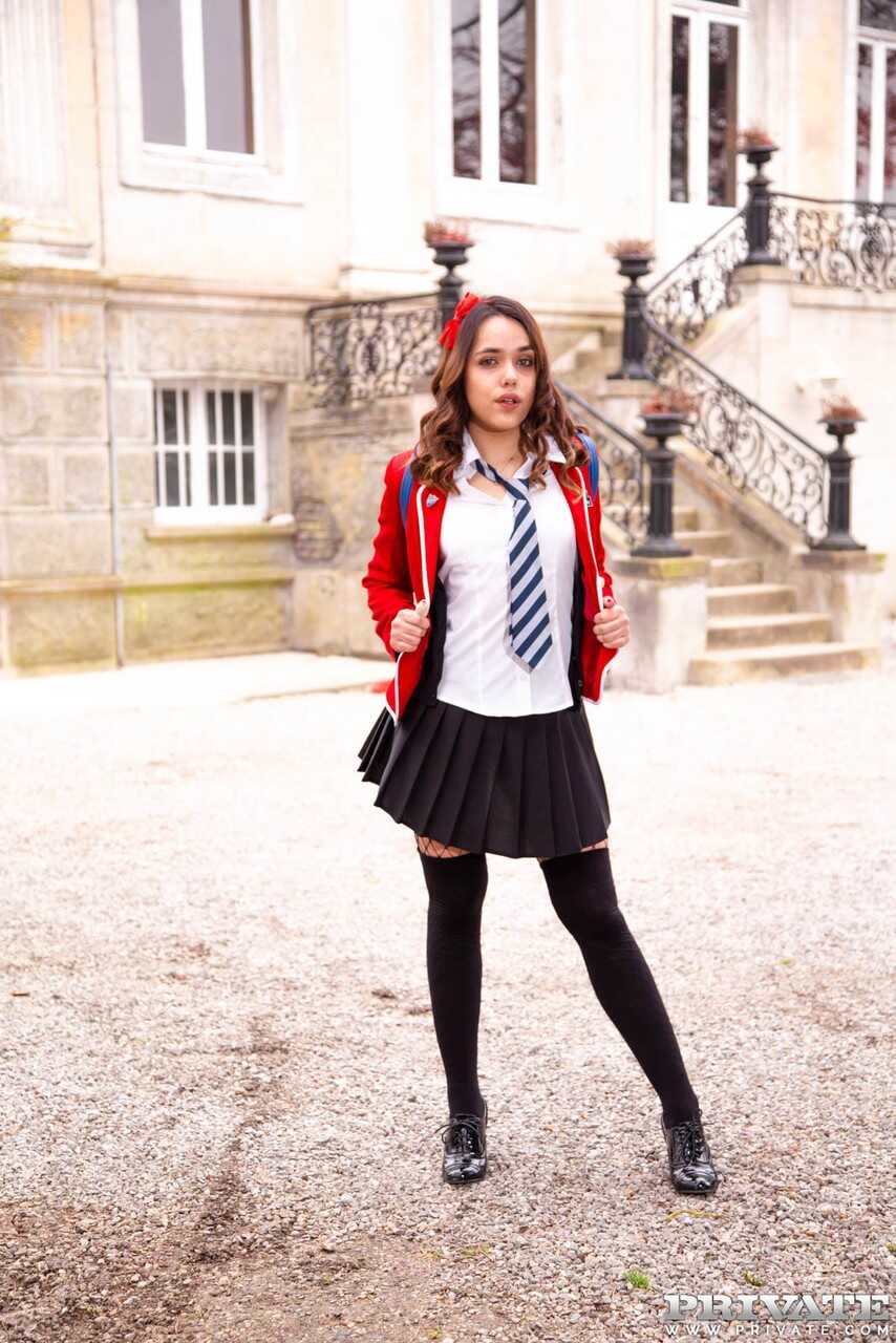 Cute Latina student Esperanza Del Horno flashes in public before a DP on the school grounds with her two classmates.