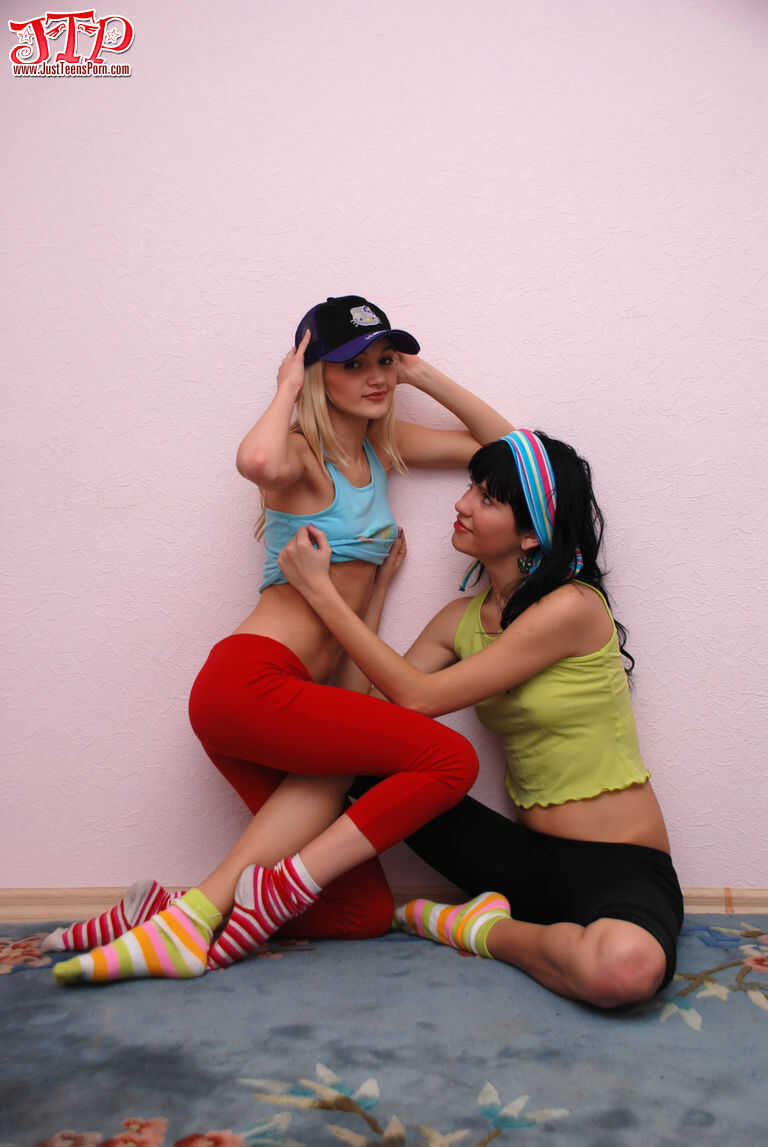 Young lesbians hump each other while stripping to their Julia B socks 