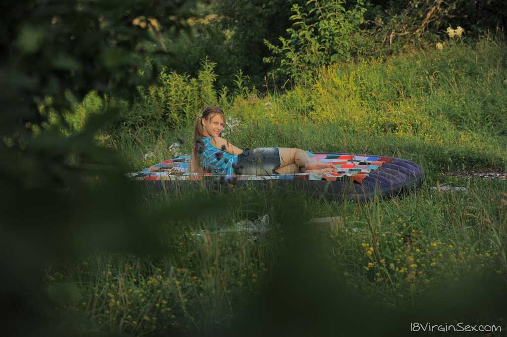 Young looking Beata Undine loses her virginity to two big dicked boys out in a field - Beata Undine