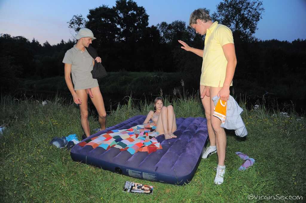 Young looking Beata Undine loses her virginity to two big dicked boys out in a field - Beata Undine