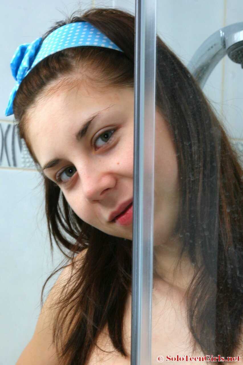 Shower Flossing: The Young and Shaven Brunette's Daily Oral Hygiene Routine - 