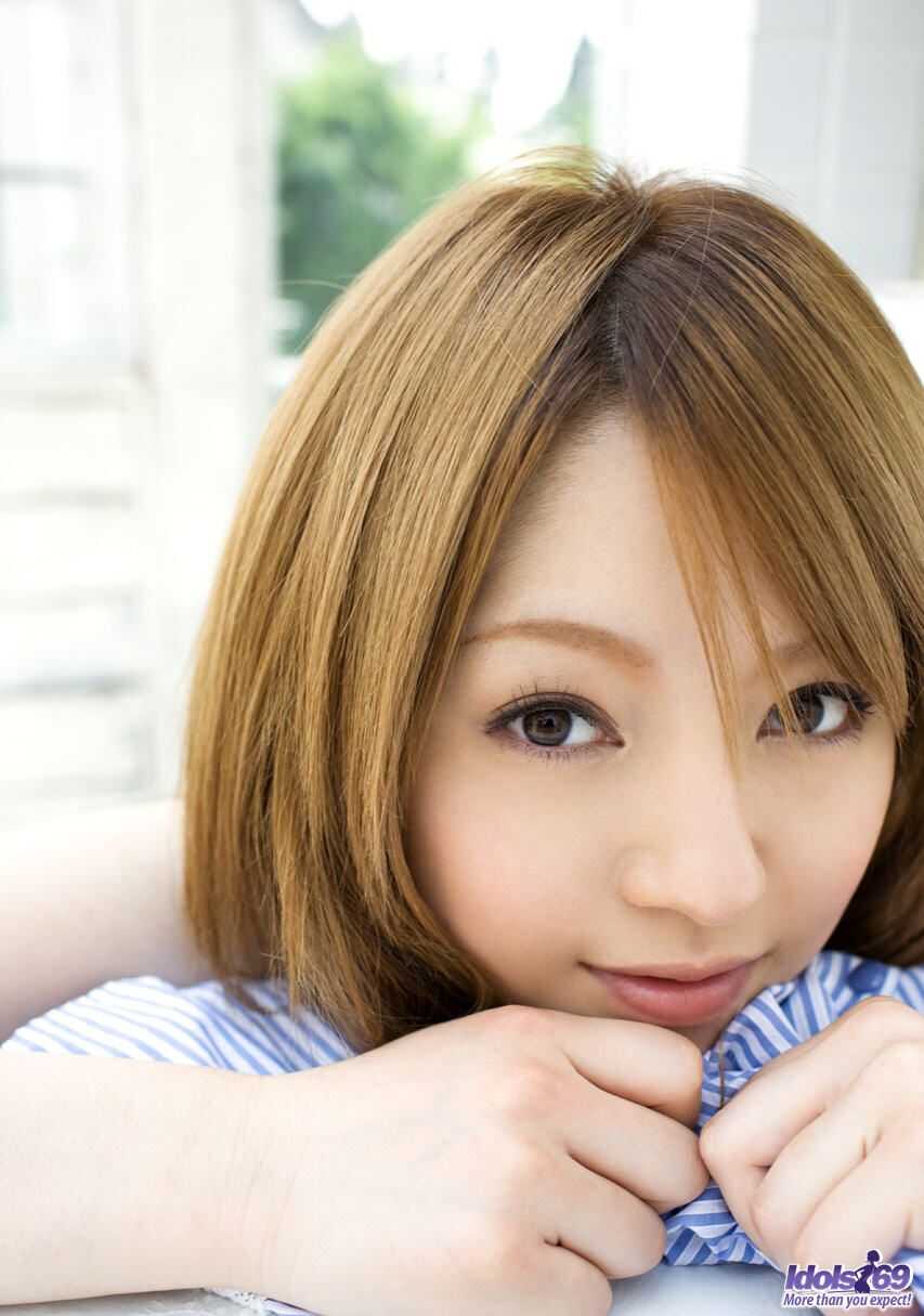 Japanese teen Ria Sakurai pleasures herself in her sexy satin brassiere and panties - Ria Sakurai