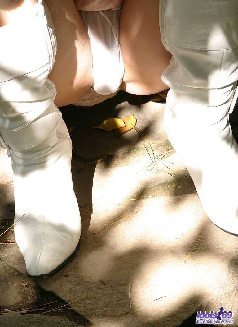 Exposing Her Tits and Bush in White Latex Boots: Nana’s Asian Adventure