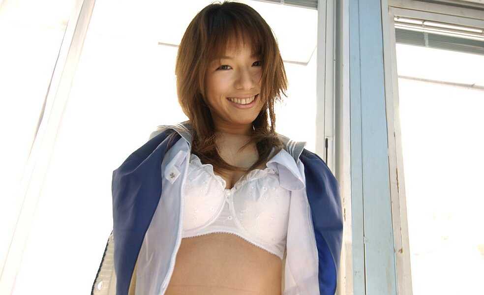 Cute Japanese student Towa Aino takes off her brassiere in a tempting manner - Towa Aino