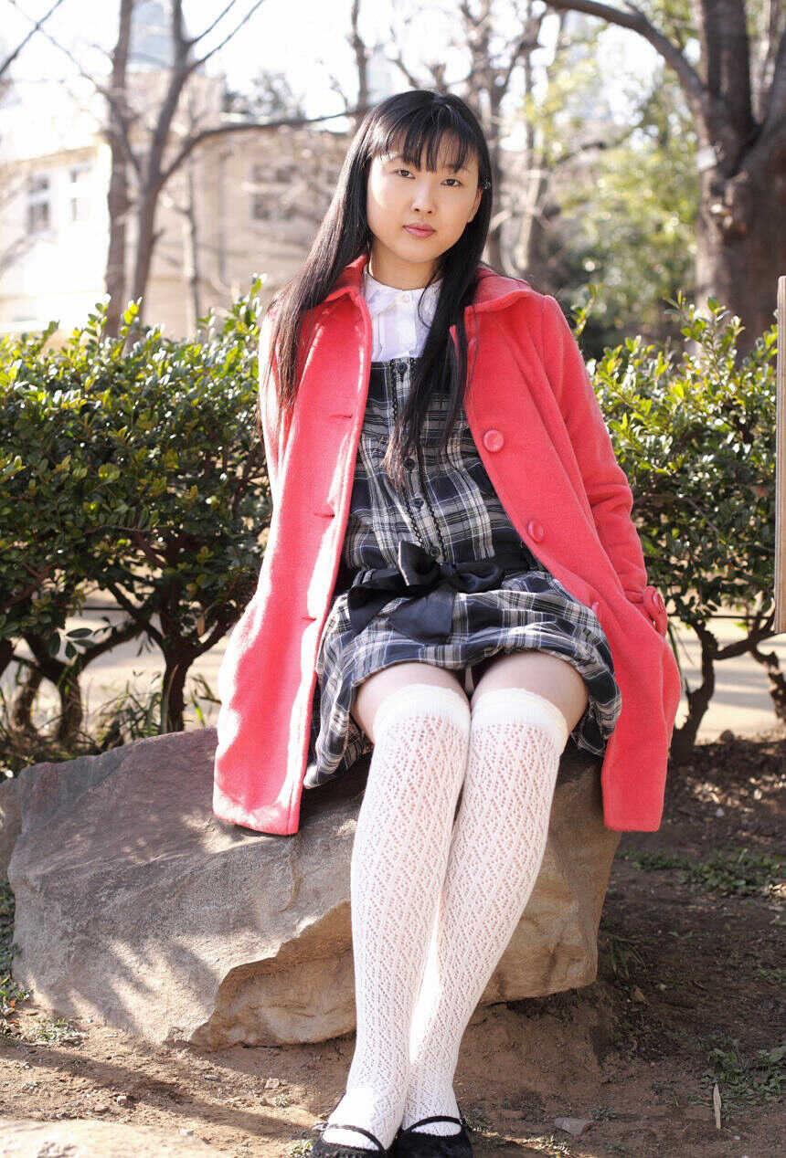Young looking Japanese schoolgirl Youko Sasaoka gets naked in white OTK socks and teases her innocent body for your pleasu...