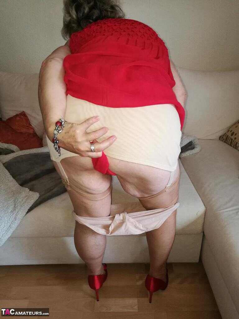 Granny Caro's Hairy Vagina on Display as She Hikes up Her Red Dress During a Hike in the Woods - Caro