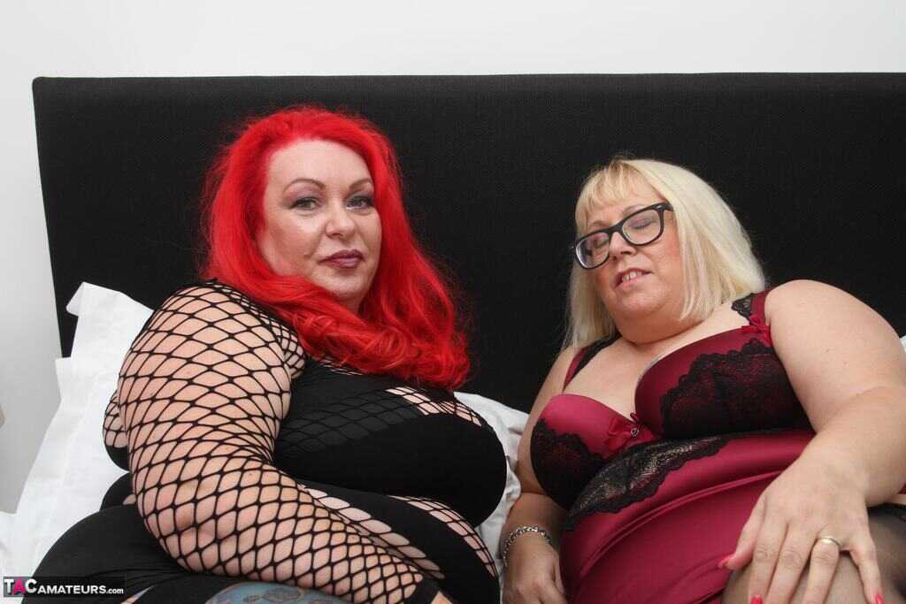 Blonde BBW Lexie Cummings takes on two big dildos with her mature redheaded friend - Lexie Cummings