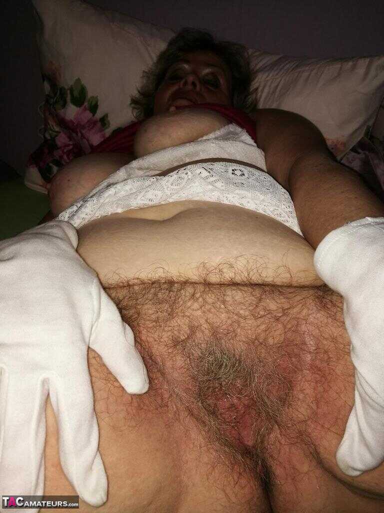 MILF Caro Goes Down on Mature Milf in White Gloves While She Shows Off Her Bush and Big Ass - Caro