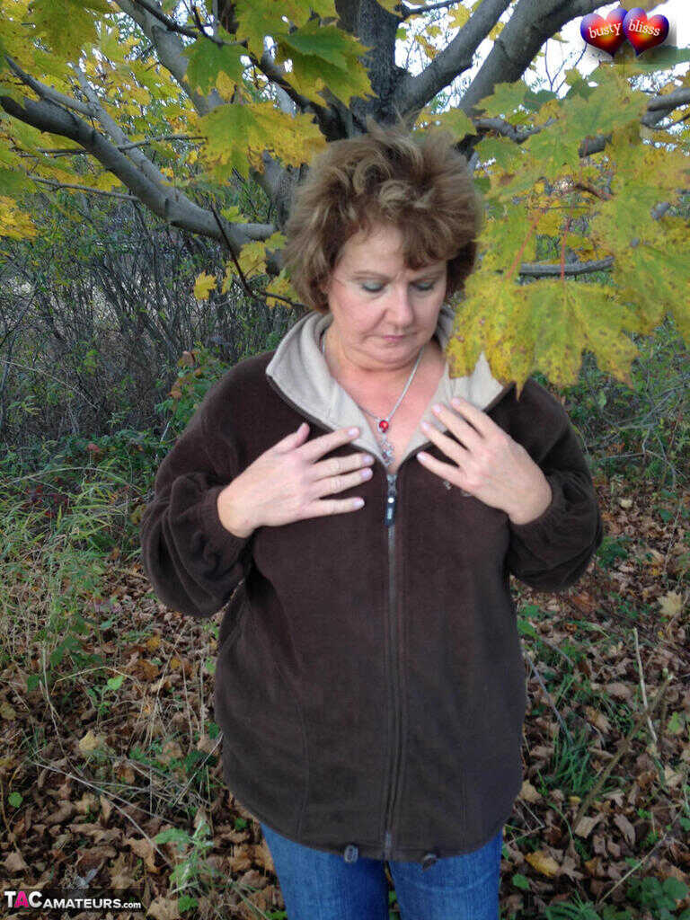 Busty Breeze Uncovers her Huge Natural Tits in the Fall, Underneath a Tree with Older Woman - Busty Bliss
