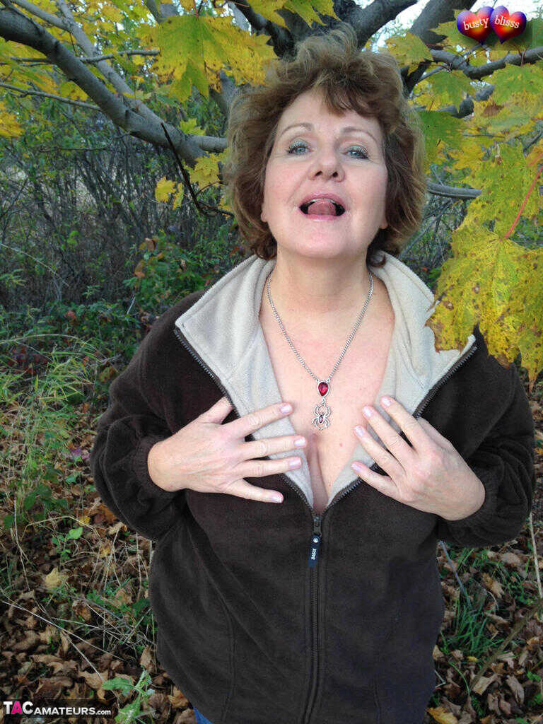 Busty Breeze Uncovers her Huge Natural Tits in the Fall, Underneath a Tree with Older Woman - Busty Bliss