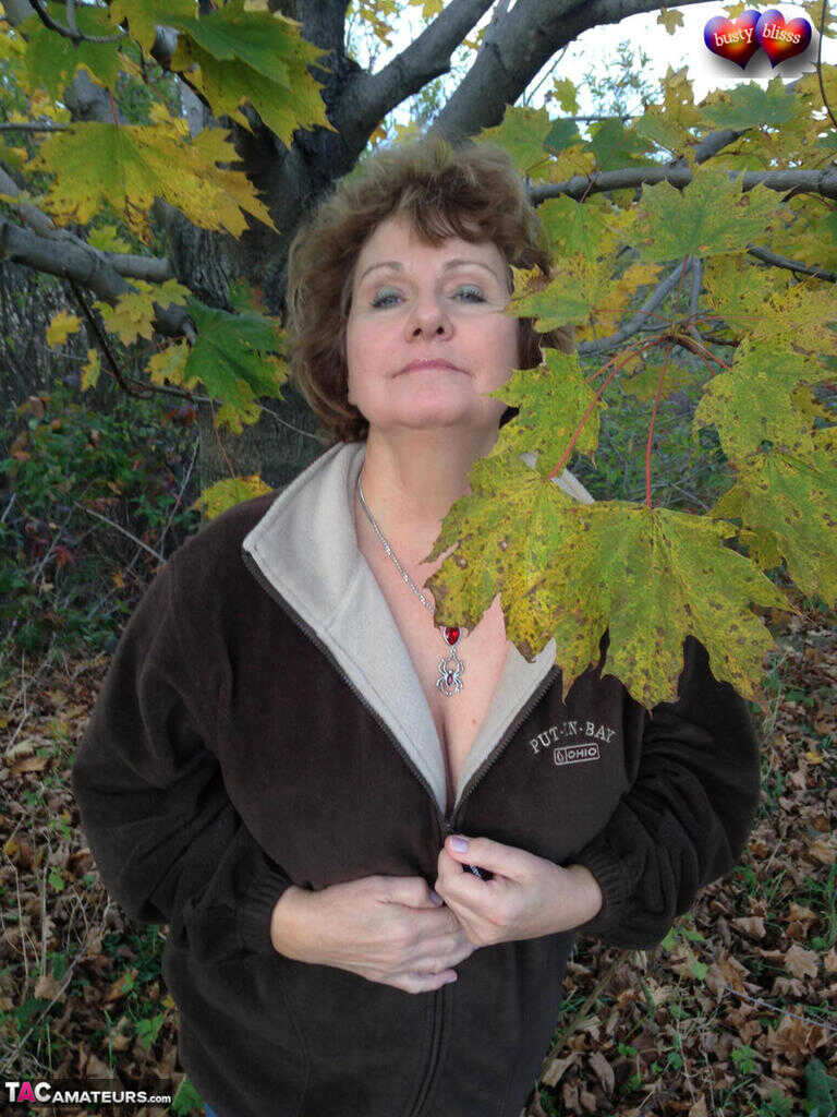 Busty Breeze Uncovers her Huge Natural Tits in the Fall, Underneath a Tree with Older Woman - Busty Bliss