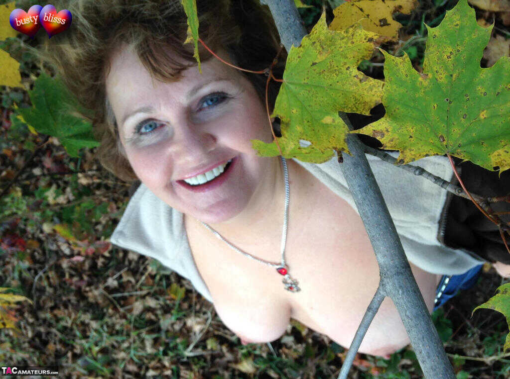 Busty Breeze Uncovers her Huge Natural Tits in the Fall, Underneath a Tree with Older Woman - Busty Bliss