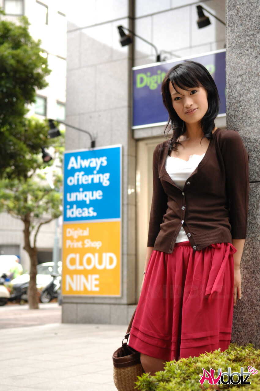 Japanese beauty Mio Kanna struts her stuff in a short skirt downtown, showing off those perfect Asian legs! - Mio Kanna