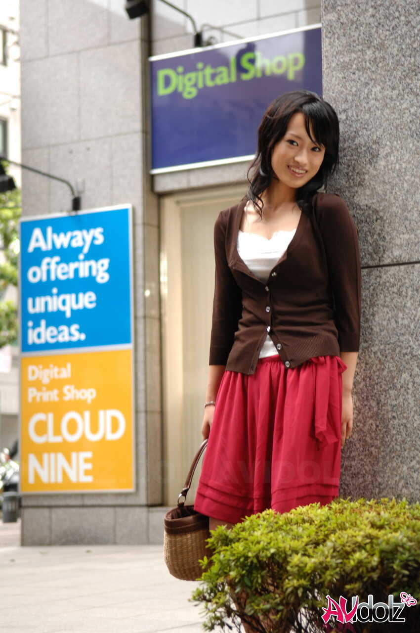 Japanese beauty Mio Kanna struts her stuff in a short skirt downtown, showing off those perfect Asian legs! - Mio Kanna