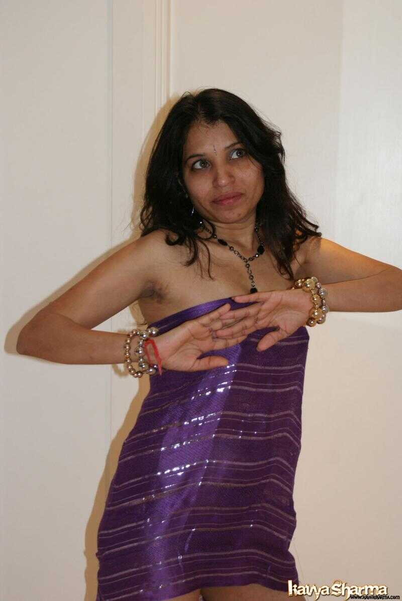 Exotic Indian MILF Kavya Sharma shows off her sexy crossed legs in a seductive non-nude gig - Kavya Sharma