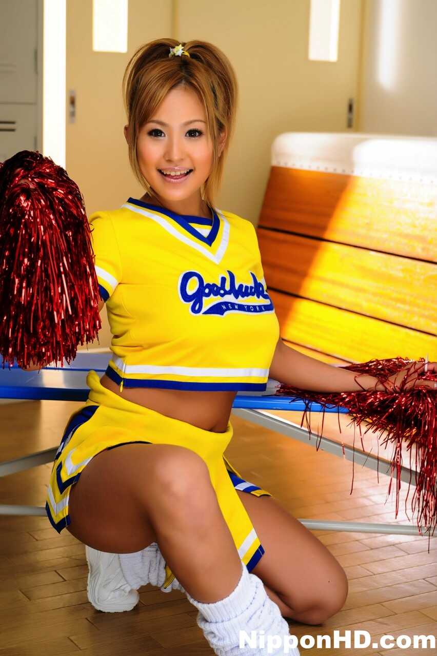 Adorable Japanese cheerleader uncovers great tits before showing her pussy - Yui Aoyama