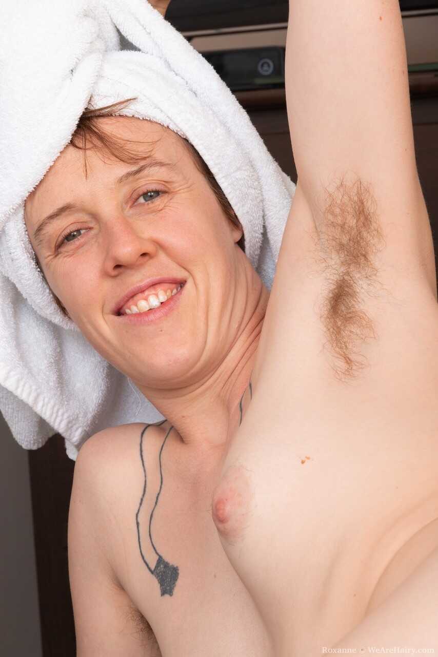 Roxanne's Ginger Beaver Unleashed: Hairy MILF Parts Her Furry Bush with a Towel on her Head! - Roxanne