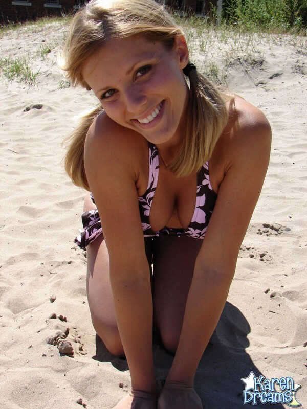 Blonde bombshell Karen flaunts her huge tits in a wet bikini on the volleyball court - Karen