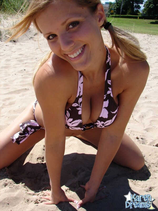 Blonde bombshell Karen flaunts her huge tits in a wet bikini on the volleyball court - Karen
