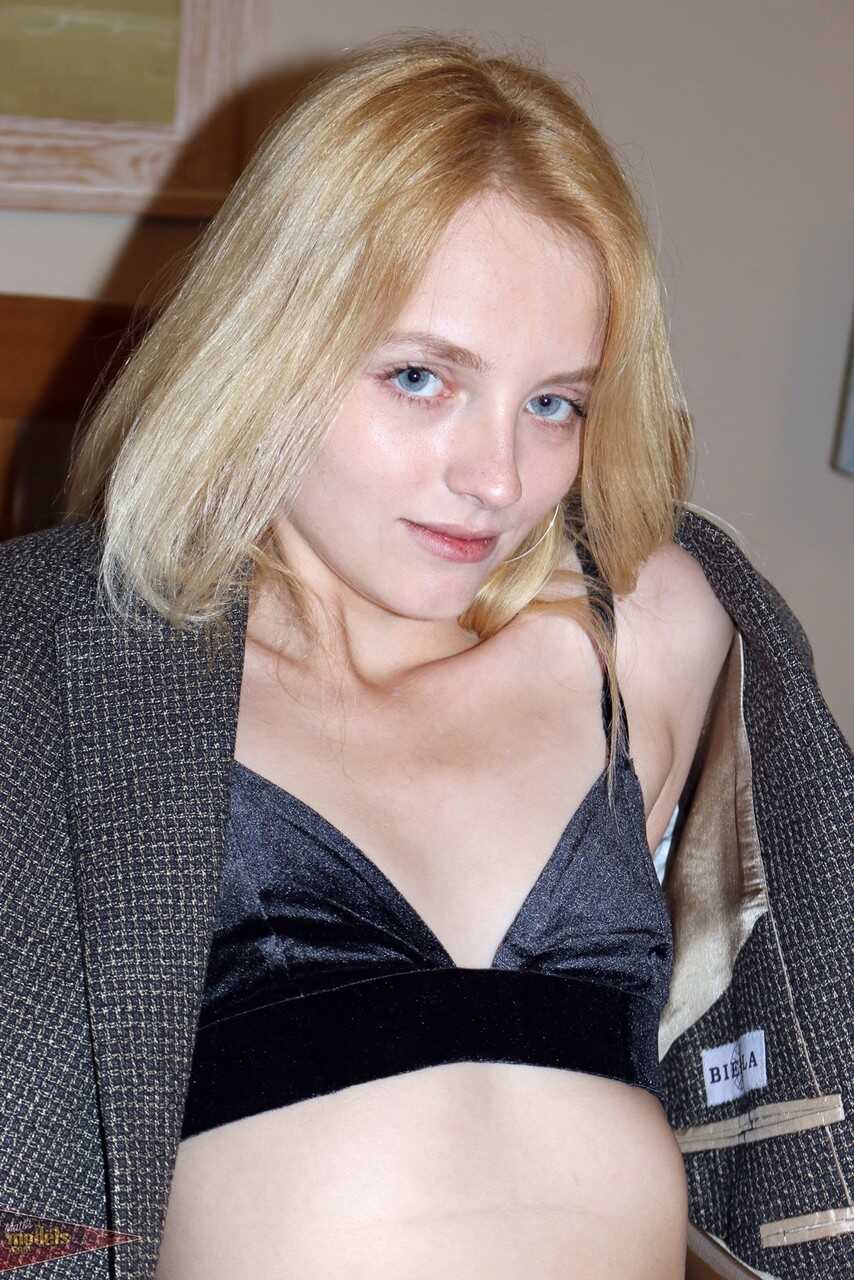 Blonde bombshell Kate Bloom spreads her tiny pink slit in thigh high socks for your pleasure. - Kate Bloom