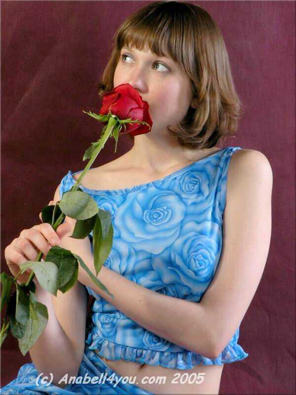 Blushing Beauty: Anabell Strips Off Her Lacy Red Dress While Holding a Rose