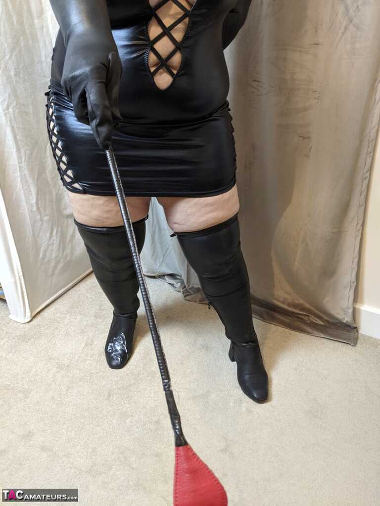 Mrs. Leather's Bald Twat Gets A Latex Crop Smackdown By A Mature Redhead Dominatrix - Mrs Leather