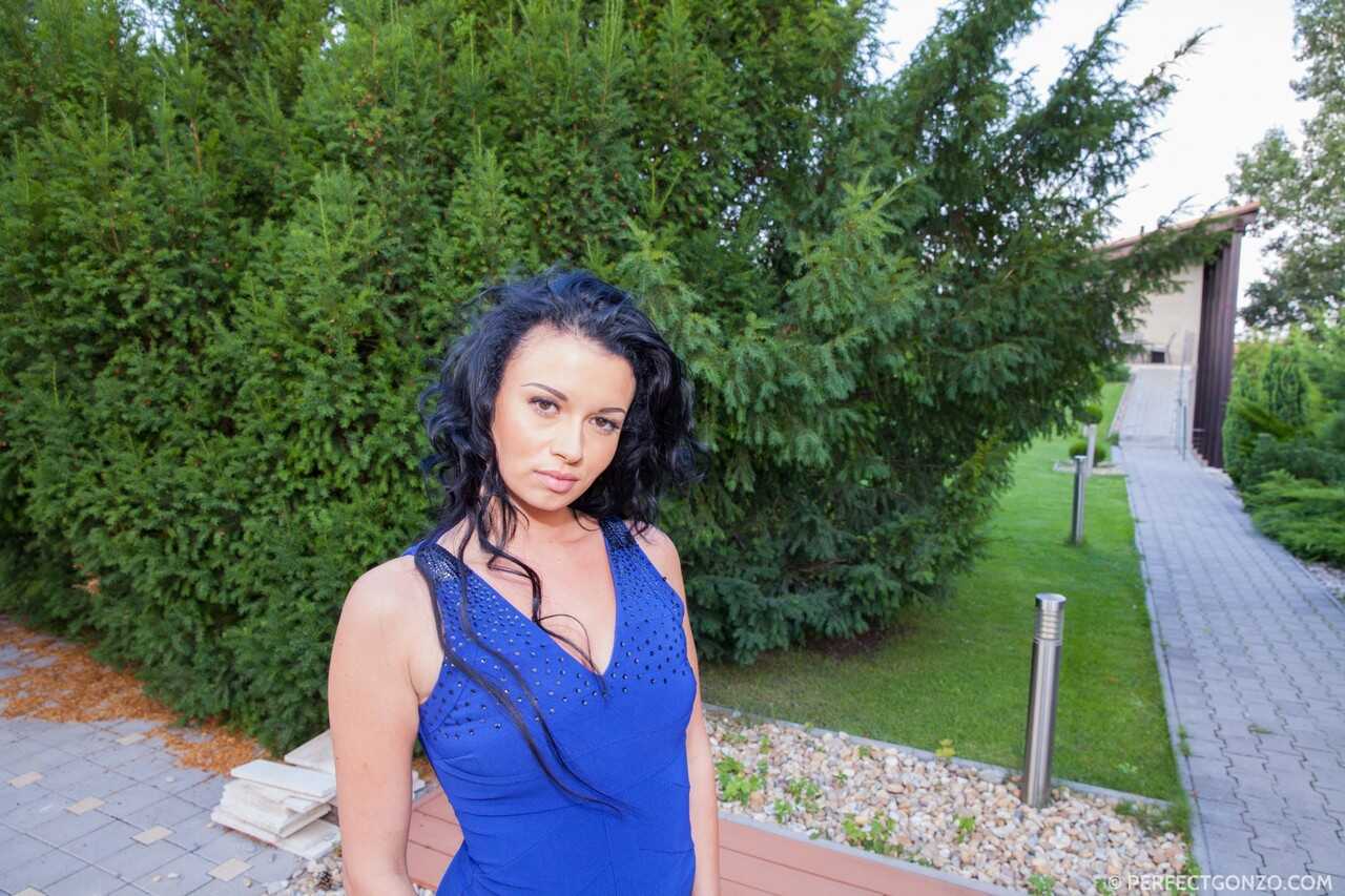 Grace Joy's Short Skirt Gets Lifted by the Wind, Exposing Her Naked Butt on a Manicured Lawn - Grace Joy