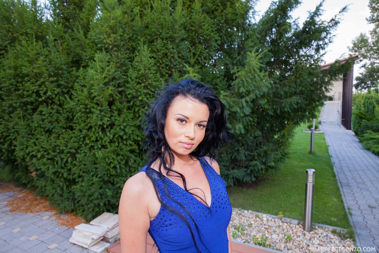 Grace Joy's Short Skirt Gets Lifted by the Wind, Exposing Her Naked Butt on a Manicured Lawn - Grace Joy