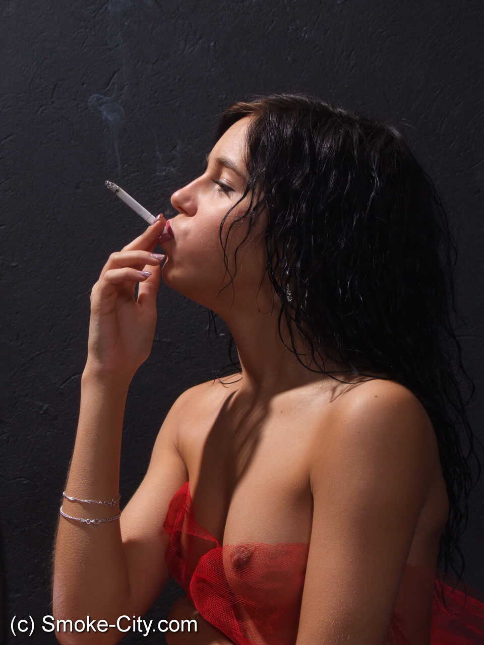 Smokin' Hot Amateur Dark Haired Nude Ciggie Butt 