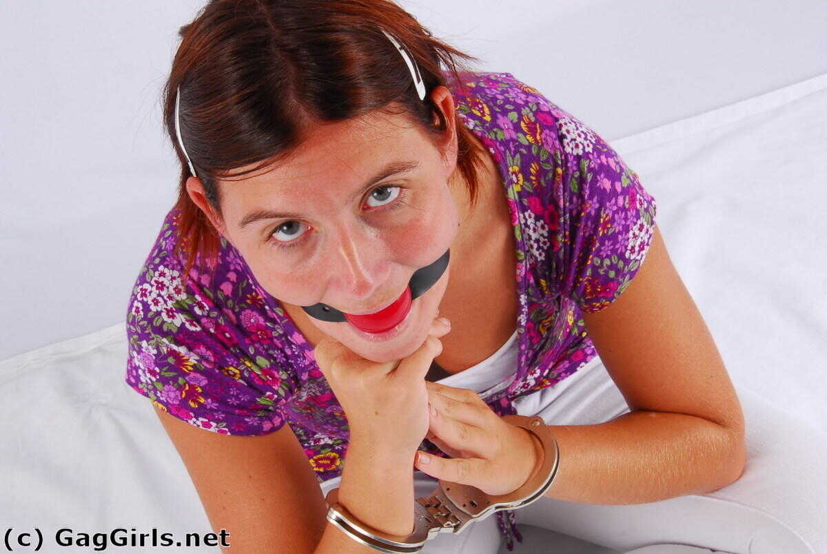 Redhanded Redhead: Fitting Herself With A Ball Gag While Wearing Handcuffs - 