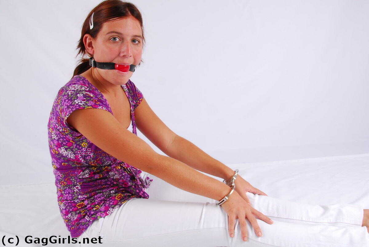 Redhanded Redhead: Fitting Herself With A Ball Gag While Wearing Handcuffs - 