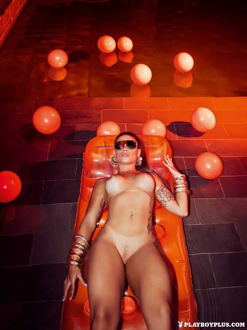 Tatted girl Rita Mattos shows off her tight ass and perky tits while posing for a centerfold shoot. - Rita Mattos