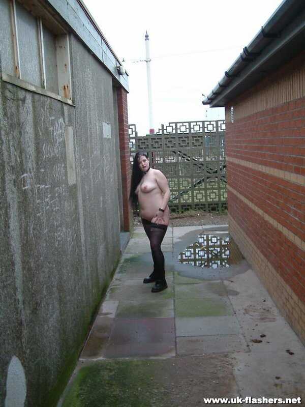 Fat British Slave's Big Tits Overflow in the Alleyway as She Peeves in Her Nylons - 