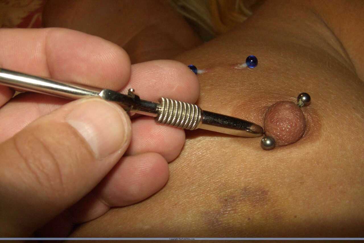 Nip Torture: Piercing the Peaks of Pleasure